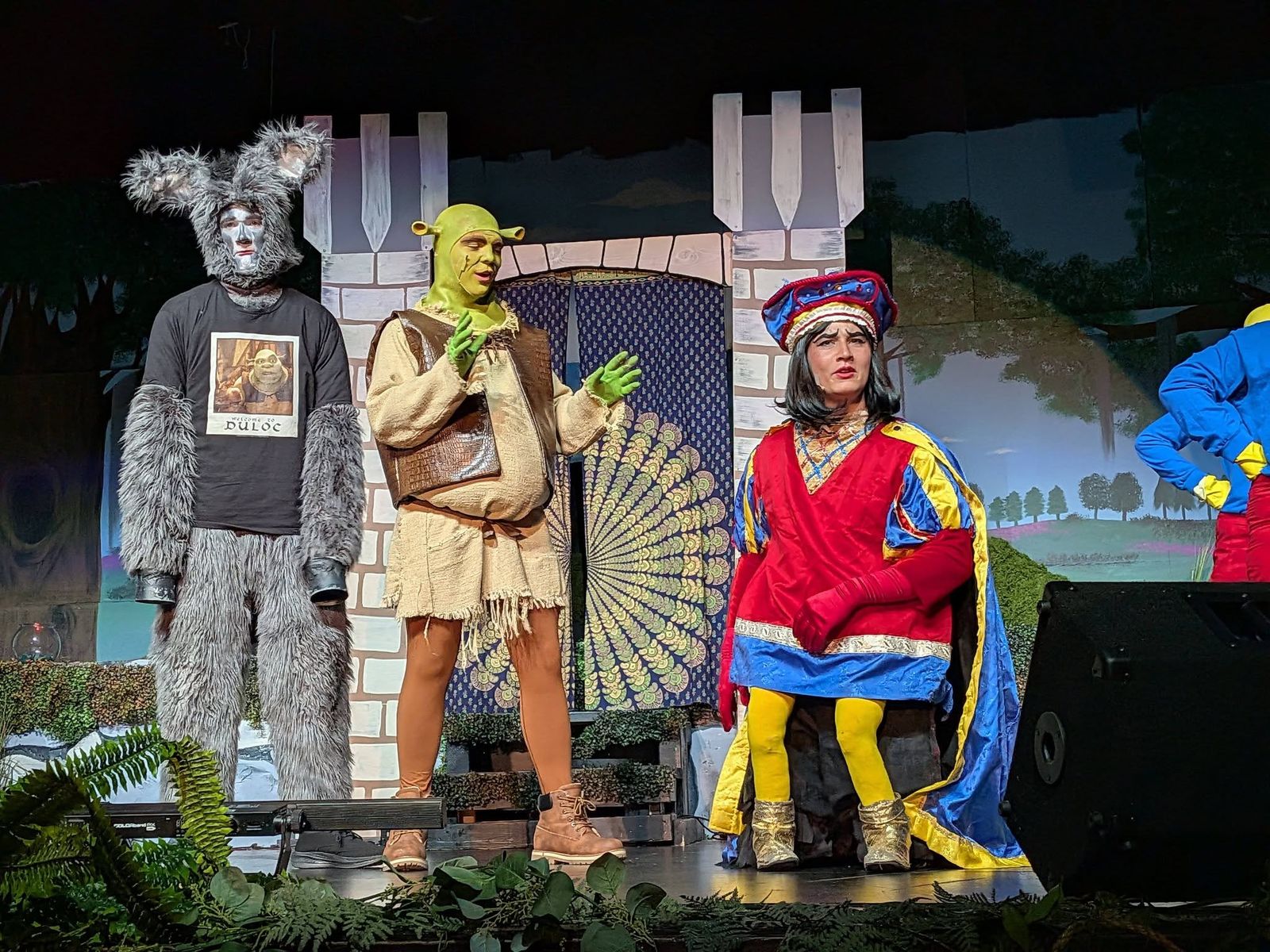 Donkey, Shrek and Lord Farquaad on stage