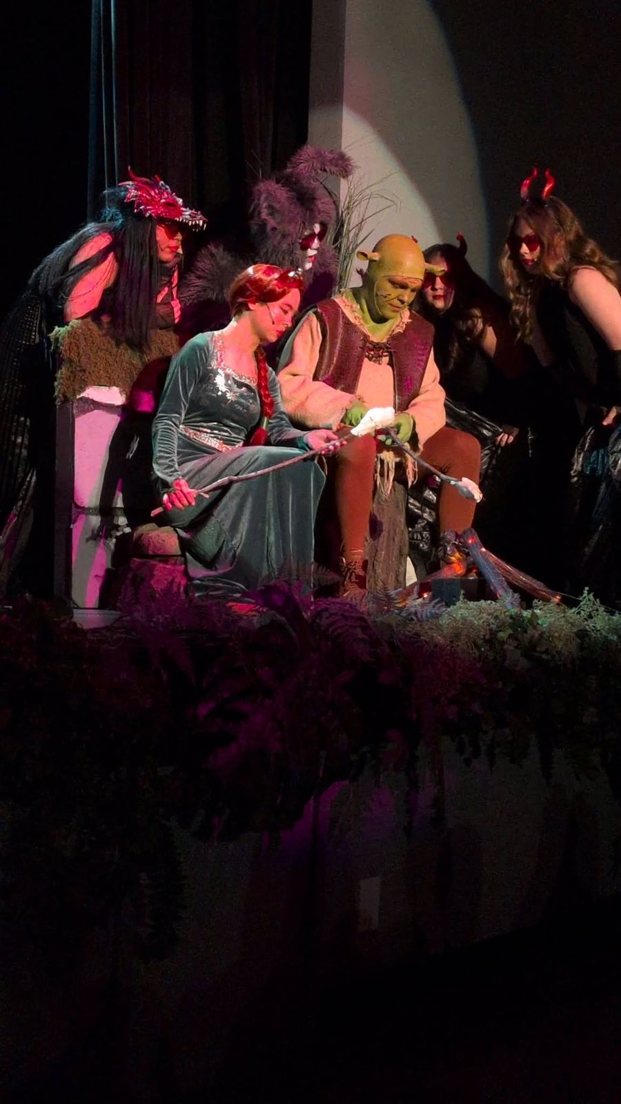 Cast in a low-lit scene